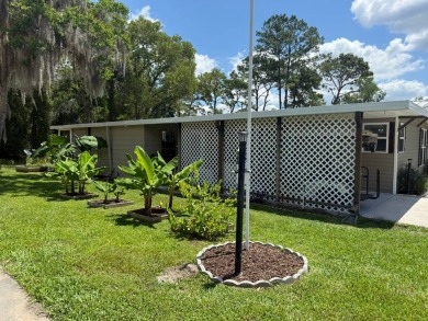 This magnificent double-wide mobile home in the desirable on Rolling Greens Executive Golf Community in Florida - for sale on GolfHomes.com, golf home, golf lot