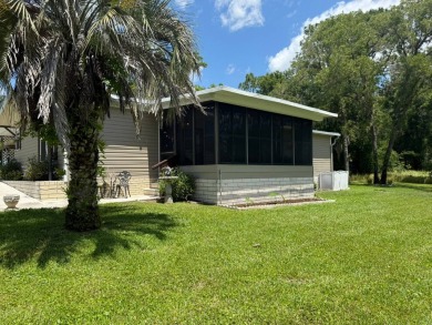 This magnificent double-wide mobile home in the desirable on Rolling Greens Executive Golf Community in Florida - for sale on GolfHomes.com, golf home, golf lot