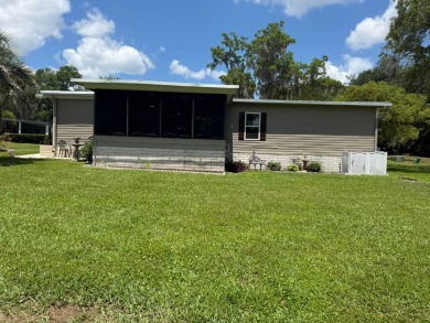 This magnificent double-wide mobile home in the desirable on Rolling Greens Executive Golf Community in Florida - for sale on GolfHomes.com, golf home, golf lot
