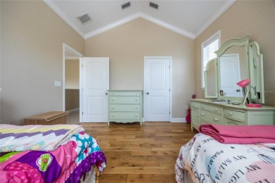 Come enjoy the cool breeze blowing across the front porch of on Haile Plantation Golf and Country Club in Florida - for sale on GolfHomes.com, golf home, golf lot