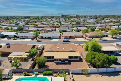 Charming 3-bedroom, 2-bath home featuring a spacious Arizona on Sun City Lakes West and East in Arizona - for sale on GolfHomes.com, golf home, golf lot