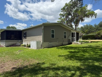 This magnificent double-wide mobile home in the desirable on Rolling Greens Executive Golf Community in Florida - for sale on GolfHomes.com, golf home, golf lot