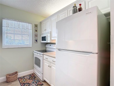 Turnkey completely furnished. Take the elevator or stairs to on Zephyrhills Municipal Golf Course in Florida - for sale on GolfHomes.com, golf home, golf lot