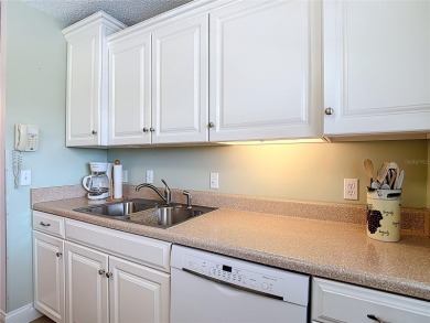 Turnkey completely furnished. Take the elevator or stairs to on Zephyrhills Municipal Golf Course in Florida - for sale on GolfHomes.com, golf home, golf lot