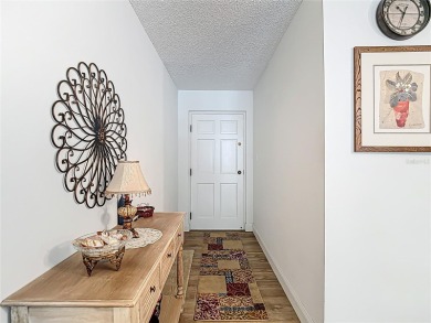 Turnkey completely furnished. Take the elevator or stairs to on Zephyrhills Municipal Golf Course in Florida - for sale on GolfHomes.com, golf home, golf lot