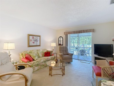 Turnkey completely furnished. Take the elevator or stairs to on Zephyrhills Municipal Golf Course in Florida - for sale on GolfHomes.com, golf home, golf lot
