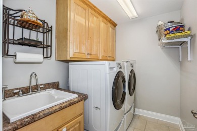 Located in the sought-after Oak Pointe community of Tiger Point on Tiger Point Golf and Country Club in Florida - for sale on GolfHomes.com, golf home, golf lot