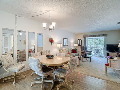 Turnkey completely furnished. Take the elevator or stairs to on Zephyrhills Municipal Golf Course in Florida - for sale on GolfHomes.com, golf home, golf lot