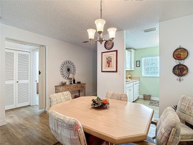 Turnkey completely furnished. Take the elevator or stairs to on Zephyrhills Municipal Golf Course in Florida - for sale on GolfHomes.com, golf home, golf lot