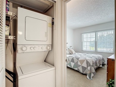 Turnkey completely furnished. Take the elevator or stairs to on Zephyrhills Municipal Golf Course in Florida - for sale on GolfHomes.com, golf home, golf lot