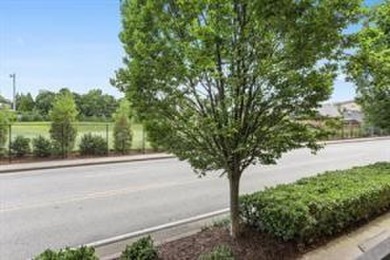 Ground floor with private patio and open view, Welcome to your on Art Foundry in Atlantic Station Golf Course in Georgia - for sale on GolfHomes.com, golf home, golf lot