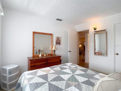 Turnkey completely furnished. Take the elevator or stairs to on Zephyrhills Municipal Golf Course in Florida - for sale on GolfHomes.com, golf home, golf lot