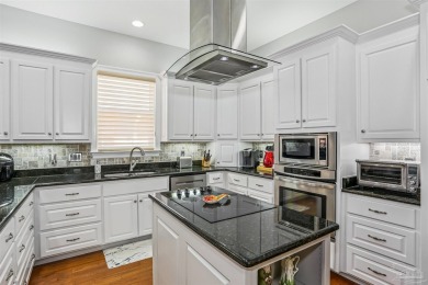 Located in the sought-after Oak Pointe community of Tiger Point on Tiger Point Golf and Country Club in Florida - for sale on GolfHomes.com, golf home, golf lot
