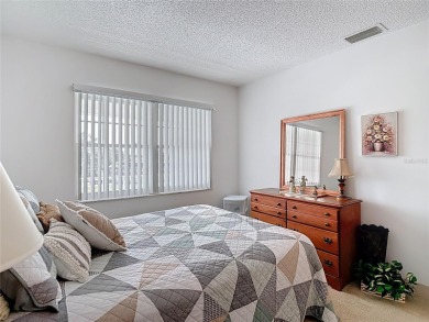 Turnkey completely furnished. Take the elevator or stairs to on Zephyrhills Municipal Golf Course in Florida - for sale on GolfHomes.com, golf home, golf lot