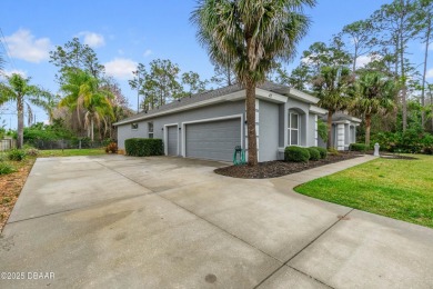 Step into your dream home, where modern luxury meets the perfect on Plantation Bay Golf and Country Club in Florida - for sale on GolfHomes.com, golf home, golf lot