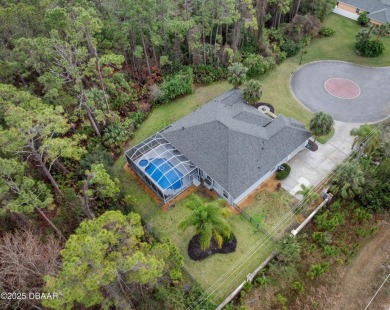 Step into your dream home, where modern luxury meets the perfect on Plantation Bay Golf and Country Club in Florida - for sale on GolfHomes.com, golf home, golf lot