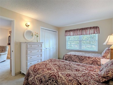 Turnkey completely furnished. Take the elevator or stairs to on Zephyrhills Municipal Golf Course in Florida - for sale on GolfHomes.com, golf home, golf lot