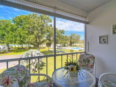 Turnkey completely furnished. Take the elevator or stairs to on Zephyrhills Municipal Golf Course in Florida - for sale on GolfHomes.com, golf home, golf lot