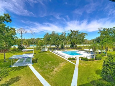 Turnkey completely furnished. Take the elevator or stairs to on Zephyrhills Municipal Golf Course in Florida - for sale on GolfHomes.com, golf home, golf lot