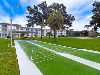 Turnkey completely furnished. Take the elevator or stairs to on Zephyrhills Municipal Golf Course in Florida - for sale on GolfHomes.com, golf home, golf lot