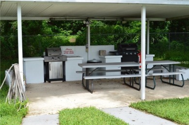 Turnkey completely furnished. Take the elevator or stairs to on Zephyrhills Municipal Golf Course in Florida - for sale on GolfHomes.com, golf home, golf lot