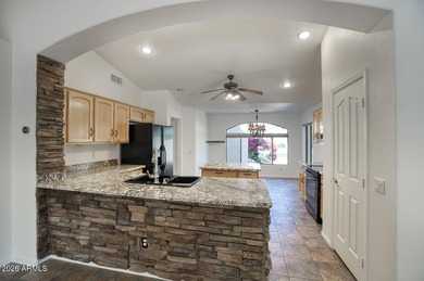 Located in the highly desirable guard-gated PebbleCreek active on Tuscany Falls At Pebble Creek in Arizona - for sale on GolfHomes.com, golf home, golf lot