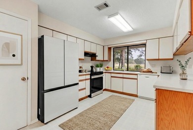 Large home on the Golf Course in Lake Lorraine Estates. This on Shalimar Pointe Golf and Country Club in Florida - for sale on GolfHomes.com, golf home, golf lot