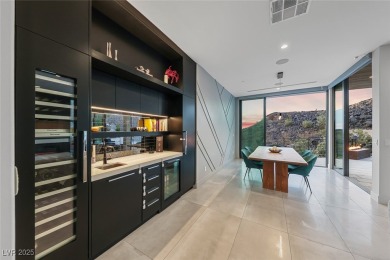 STUNNING STRIP, MOUNTAIN AND CITY VIEWS IN THIS RARE SOUGHT on Dragon Ridge Country Club in Nevada - for sale on GolfHomes.com, golf home, golf lot