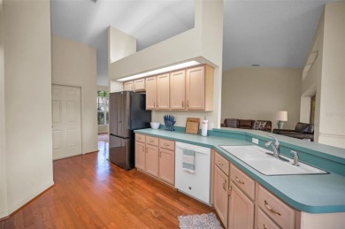 IN TIMBER GREENS A 55+ GATED GOLF COMMUNITY, THIS HOME IS on Timber Greens Country Club in Florida - for sale on GolfHomes.com, golf home, golf lot