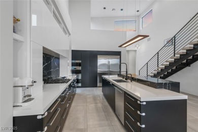 STUNNING STRIP, MOUNTAIN AND CITY VIEWS IN THIS RARE SOUGHT on Dragon Ridge Country Club in Nevada - for sale on GolfHomes.com, golf home, golf lot