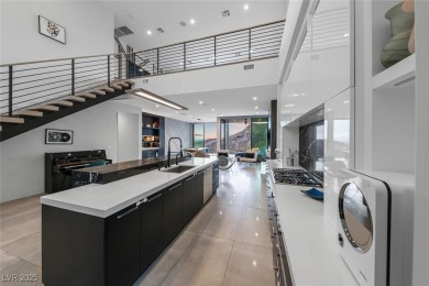 STUNNING STRIP, MOUNTAIN AND CITY VIEWS IN THIS RARE SOUGHT on Dragon Ridge Country Club in Nevada - for sale on GolfHomes.com, golf home, golf lot