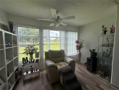 Beautiful corner unit  1/1/.5 condo in this 55+ community  with on Sunrise Lakes Phase III in Florida - for sale on GolfHomes.com, golf home, golf lot