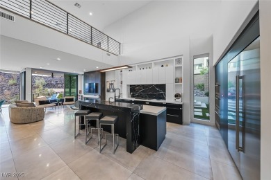STUNNING STRIP, MOUNTAIN AND CITY VIEWS IN THIS RARE SOUGHT on Dragon Ridge Country Club in Nevada - for sale on GolfHomes.com, golf home, golf lot