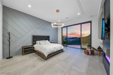 STUNNING STRIP, MOUNTAIN AND CITY VIEWS IN THIS RARE SOUGHT on Dragon Ridge Country Club in Nevada - for sale on GolfHomes.com, golf home, golf lot
