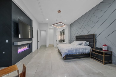 STUNNING STRIP, MOUNTAIN AND CITY VIEWS IN THIS RARE SOUGHT on Dragon Ridge Country Club in Nevada - for sale on GolfHomes.com, golf home, golf lot