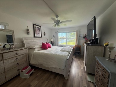 Beautiful corner unit  1/1/.5 condo in this 55+ community  with on Sunrise Lakes Phase III in Florida - for sale on GolfHomes.com, golf home, golf lot