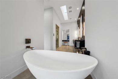 STUNNING STRIP, MOUNTAIN AND CITY VIEWS IN THIS RARE SOUGHT on Dragon Ridge Country Club in Nevada - for sale on GolfHomes.com, golf home, golf lot