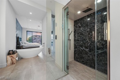 STUNNING STRIP, MOUNTAIN AND CITY VIEWS IN THIS RARE SOUGHT on Dragon Ridge Country Club in Nevada - for sale on GolfHomes.com, golf home, golf lot