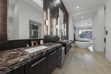 STUNNING STRIP, MOUNTAIN AND CITY VIEWS IN THIS RARE SOUGHT on Dragon Ridge Country Club in Nevada - for sale on GolfHomes.com, golf home, golf lot
