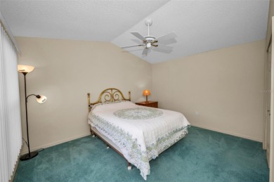 IN TIMBER GREENS A 55+ GATED GOLF COMMUNITY, THIS HOME IS on Timber Greens Country Club in Florida - for sale on GolfHomes.com, golf home, golf lot