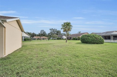 IN TIMBER GREENS A 55+ GATED GOLF COMMUNITY, THIS HOME IS on Timber Greens Country Club in Florida - for sale on GolfHomes.com, golf home, golf lot