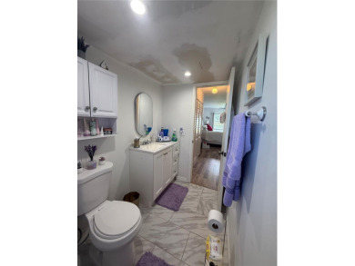 Beautiful corner unit  1/1/.5 condo in this 55+ community  with on Sunrise Lakes Phase III in Florida - for sale on GolfHomes.com, golf home, golf lot