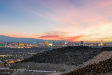 STUNNING STRIP, MOUNTAIN AND CITY VIEWS IN THIS RARE SOUGHT on Dragon Ridge Country Club in Nevada - for sale on GolfHomes.com, golf home, golf lot
