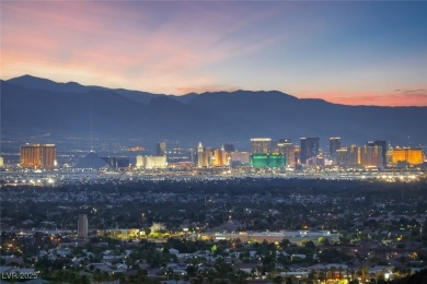 STUNNING STRIP, MOUNTAIN AND CITY VIEWS IN THIS RARE SOUGHT on Dragon Ridge Country Club in Nevada - for sale on GolfHomes.com, golf home, golf lot