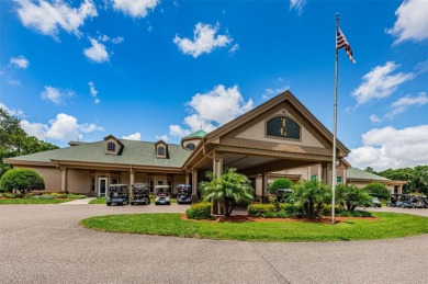 IN TIMBER GREENS A 55+ GATED GOLF COMMUNITY, THIS HOME IS on Timber Greens Country Club in Florida - for sale on GolfHomes.com, golf home, golf lot