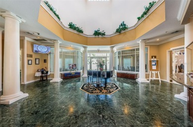 IN TIMBER GREENS A 55+ GATED GOLF COMMUNITY, THIS HOME IS on Timber Greens Country Club in Florida - for sale on GolfHomes.com, golf home, golf lot