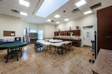 IN TIMBER GREENS A 55+ GATED GOLF COMMUNITY, THIS HOME IS on Timber Greens Country Club in Florida - for sale on GolfHomes.com, golf home, golf lot