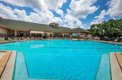 IN TIMBER GREENS A 55+ GATED GOLF COMMUNITY, THIS HOME IS on Timber Greens Country Club in Florida - for sale on GolfHomes.com, golf home, golf lot