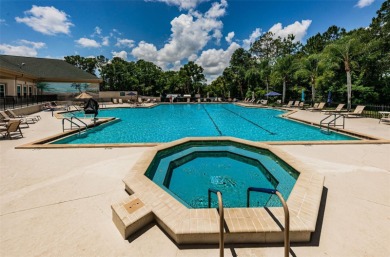 IN TIMBER GREENS A 55+ GATED GOLF COMMUNITY, THIS HOME IS on Timber Greens Country Club in Florida - for sale on GolfHomes.com, golf home, golf lot