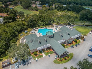 IN TIMBER GREENS A 55+ GATED GOLF COMMUNITY, THIS HOME IS on Timber Greens Country Club in Florida - for sale on GolfHomes.com, golf home, golf lot